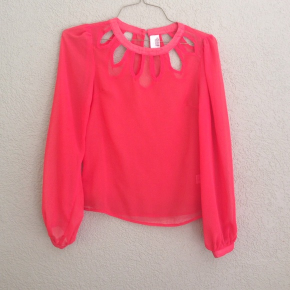 Coral/bright red colored blouse