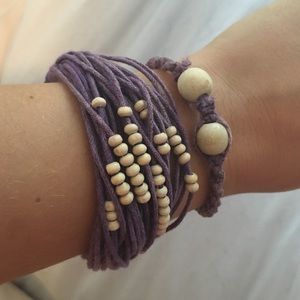 two purple beaded bracelets.