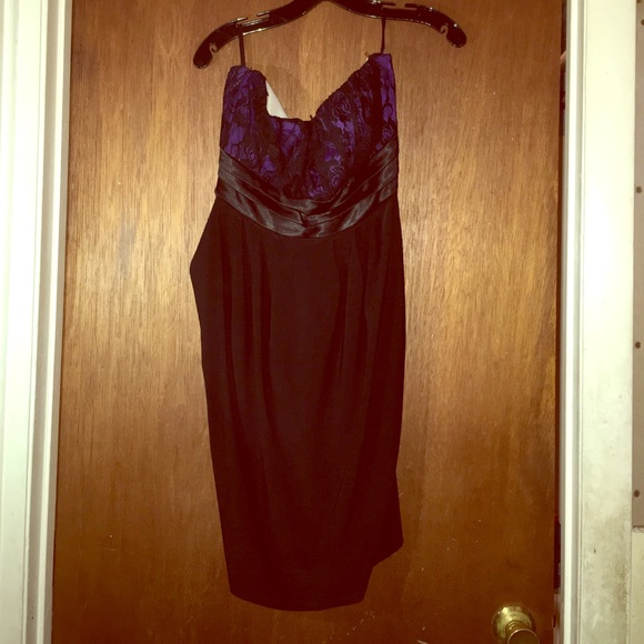 Black dress with lace detailing. Purple undertone
