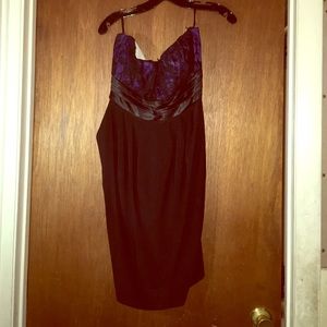 Black dress with lace detailing. Purple undertone