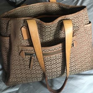 Coach baby bag. Comes with diaper pad.