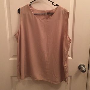 Nice beige pullover blouse with button on the back