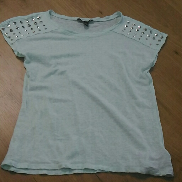 Teal shirt with studs on the shoulders