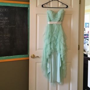 Mint high low strapless dress with ruffle bottom