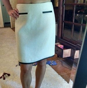Beige pencil skirt with black leather trim