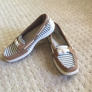 Tan and dark blue colored sperrys never worn