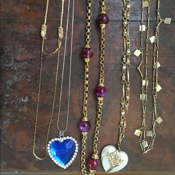 5 vintage necklaces.