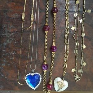 5 vintage necklaces.