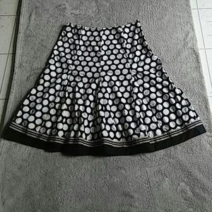 Black and white polka dots skirt. (Br) Robbie Bee.