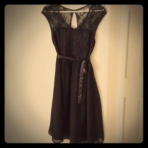Little black dress with lace bodice.