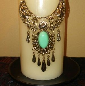 Gold necklace with blue stone