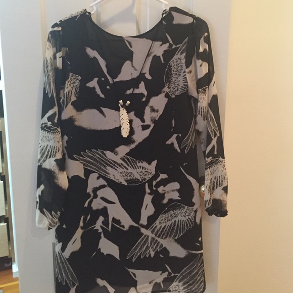 Long sleeve Tricia Fix dress.