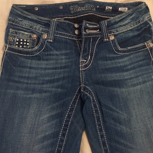 Silver winged Miss Me jeans