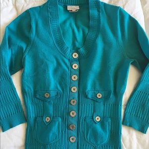 Knit top with scoop neck. Goes great with jeans!