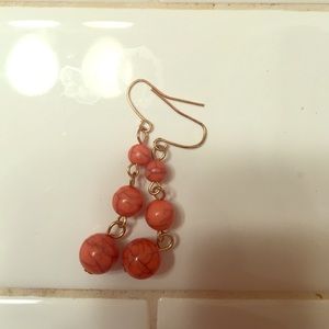red dangle earrings