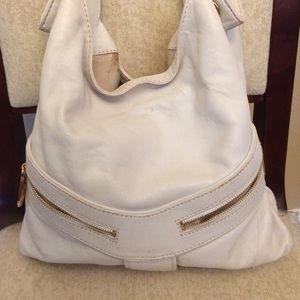 Leather micheal kors puede