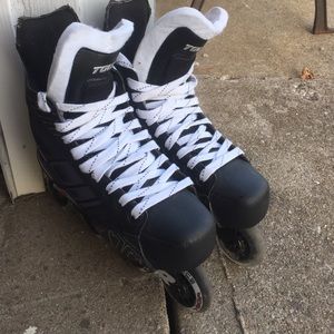 Tour roller blades.  Size 9