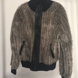 Faux fur zip up jacket.