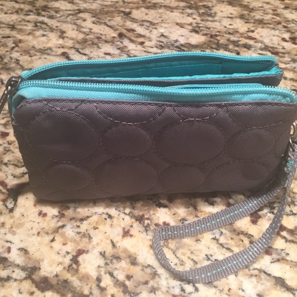 Thirty one wristlet wallet in gray and turquoise.