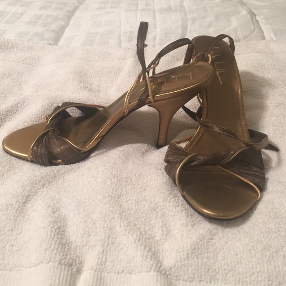 Gold, strapped Nicole Miller heels. - Picture 2 of 3