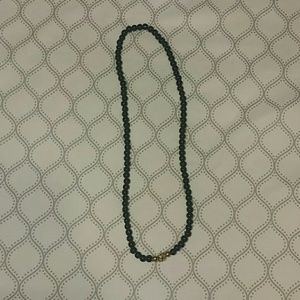Black pearl necklace with sparkling center