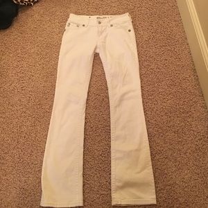 Miss Me white boot legged jeans.
