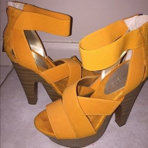 Orange strappy platform Bakers sandals