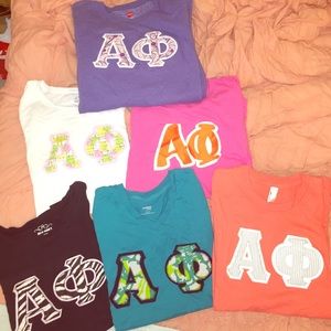 Bundle of Alpha Phi letter shirts and pullover