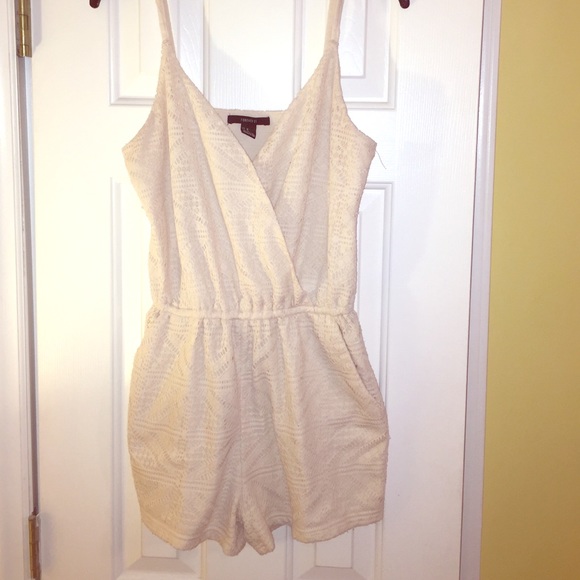 Forever 21 cream romper size medium.