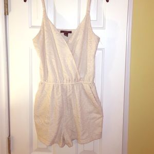 Forever 21 cream romper size medium.