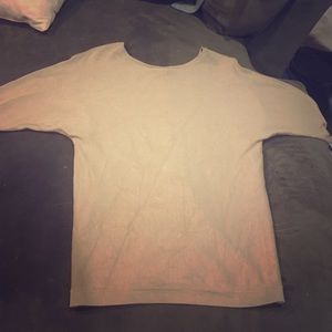 Tan sweater w/ black bow embellishments