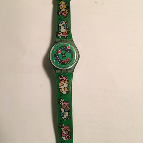A collectible Swatch watch " Cows and Train"