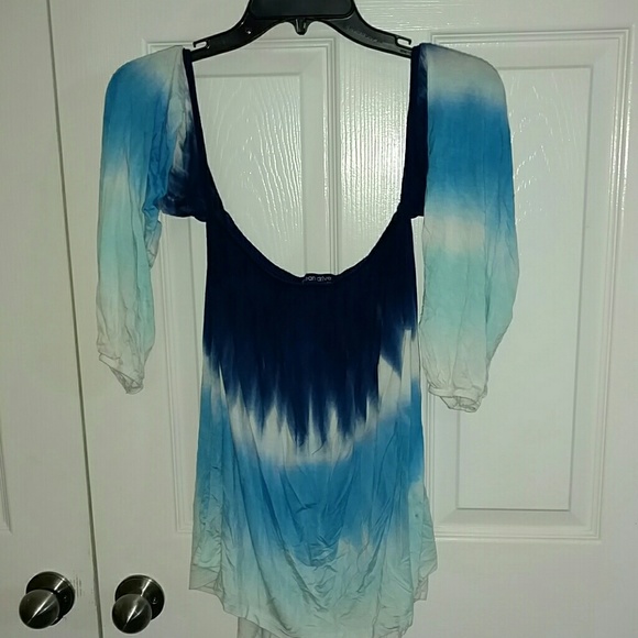 Multiple colored, off the shoulder shirt.