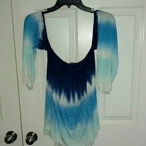 Multiple colored, off the shoulder shirt.