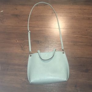 Urban Outfitters blue and gray reversible satchel