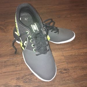 Black/neon yellow Nike indoor soccer shoes