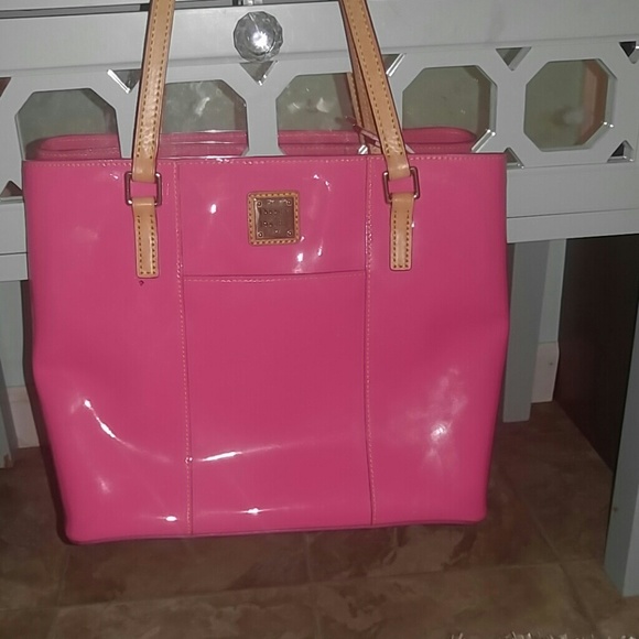 Dooney And Bourke embossed coral leather bag