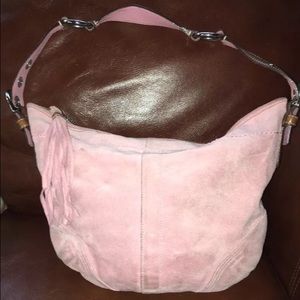Pink suede Coach handbag with brown leather handle