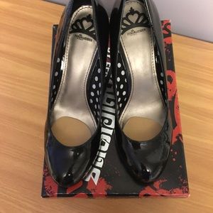 Size 9.5 black patent heels