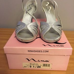 Size 9.5 silver heels perfect for formal events!