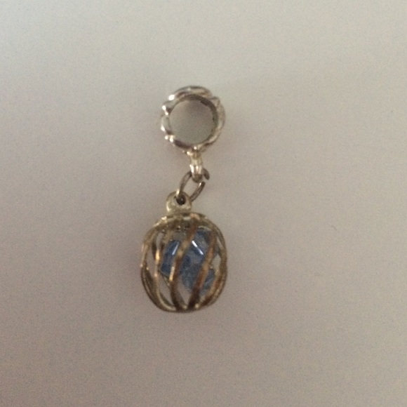 caged blue gems dangle charm