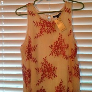 Max edition "grapefruit" sleeveless blouse.