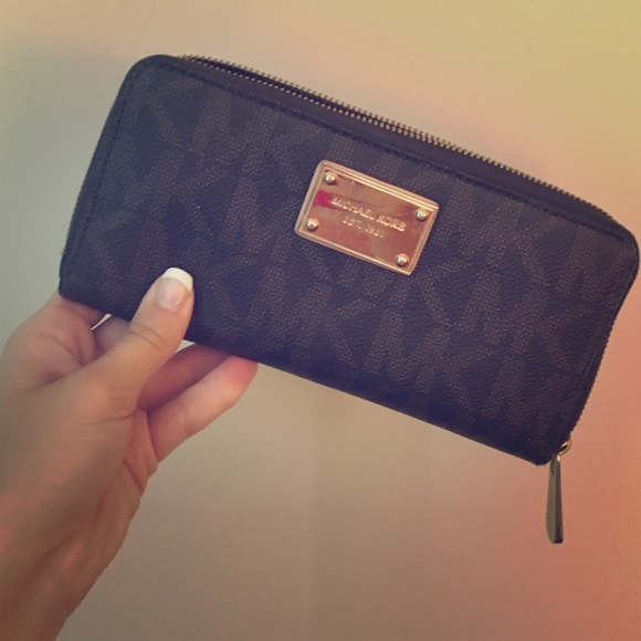 Michael Kors classic zip around wallet.