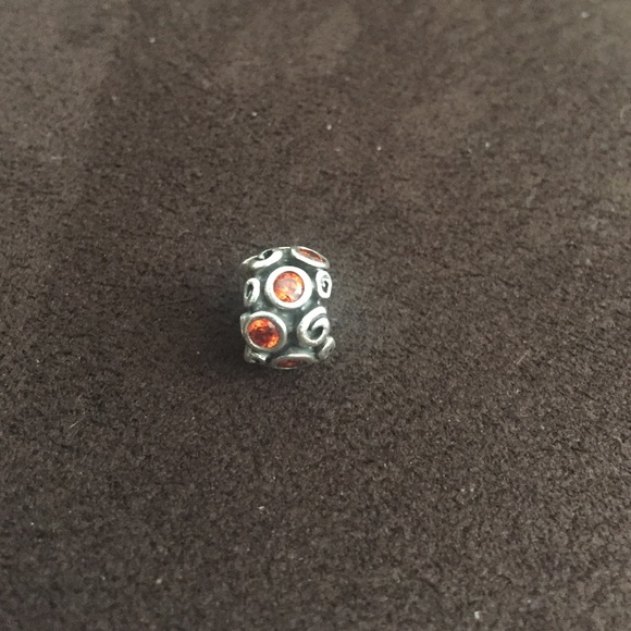 Pandora charm with orange stones