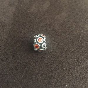 Pandora charm with orange stones
