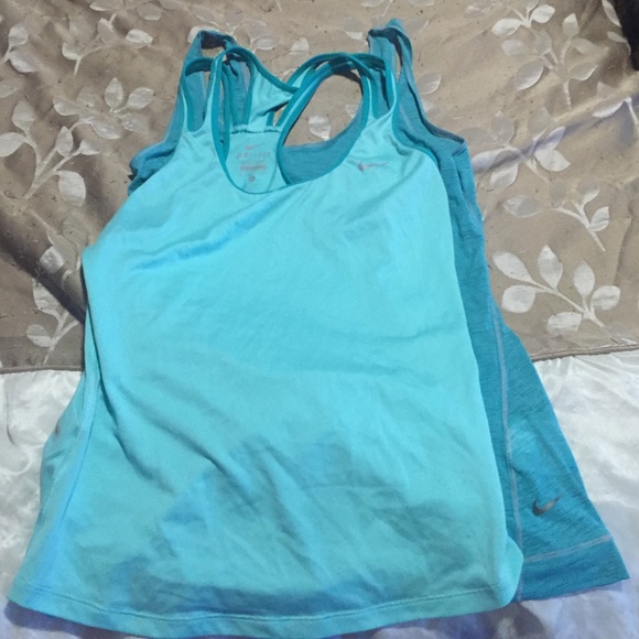 Two size small. Nike workout tanks