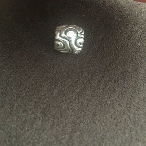 Pandora charm with clear diamonds and design