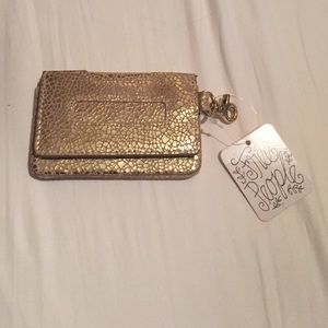 Metallic gold patterned free people wallet