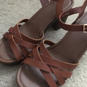 Brown heeled sandles.