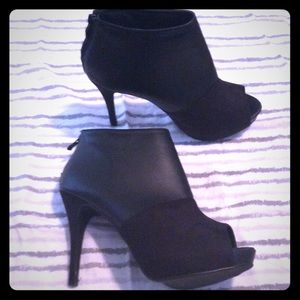 Black high heeled Ashley Stewart pumps
